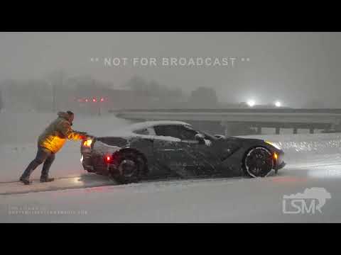01-16-2021 Spartanburg, SC-Heavy snow, cars sliding on icy roads sot stuck driver