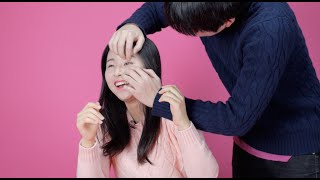 Korean girls try to open their eyes