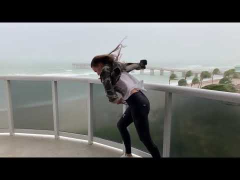 Girl flying away during super strong wind ! 23mph killer strength winds in Miami !