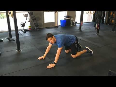 Push-up with alternating arm reach