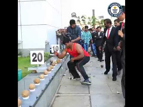 Most Coconuts Smashed With One Hand In A Minute - Guinness World Records