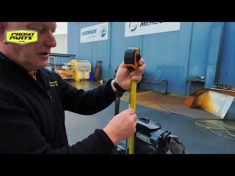 Adjusting the shift rod height on a Johnson and Evinrude outboard gear case.