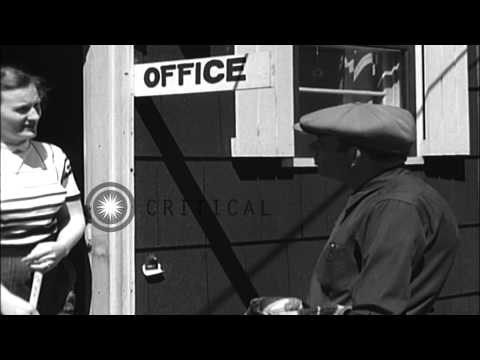 Civilians enter doorway to attend Ground Observer Corps meeting for Operation Sky...HD Stock Footage