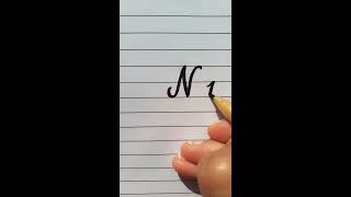 How to write N letter in Cursive Writing.