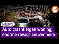 Enorme ravage na crash auto tegen gevel in Leuvenheim