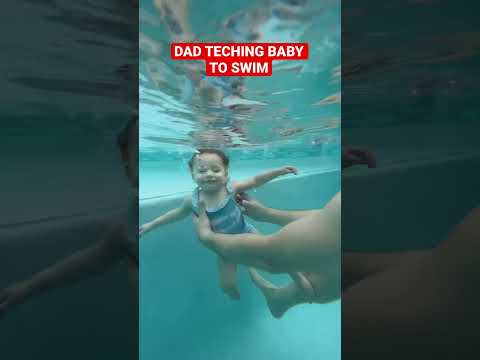 DAD PULLS HIS BABY IN THE POOL