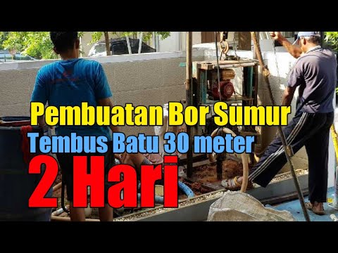 Proses bor sumur menembus lapisan batu