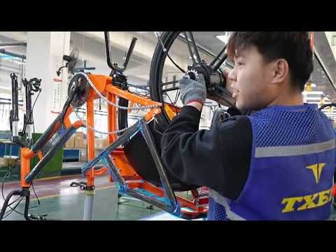 Inside the TXED factory assembly line during e-bike production