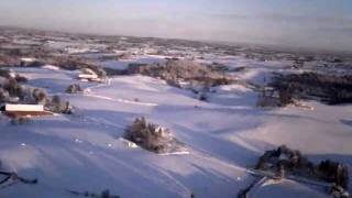 preview picture of video 'RC Piper J3 CUB FPV, in sunset, landscape covered in snow.'