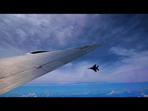 Airmen of Team Kadena are highlighted in the Keystone Theater National Anthem