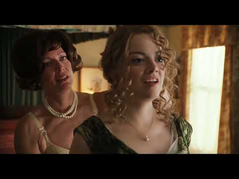 Trailer frame of Aibileen at a kitchen table, matching the score’s restrained piano-and-strings tone