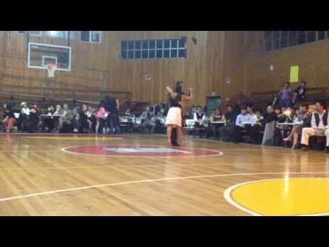  Mamié Sancy  and  Felipe Zarzar  are  dancing  to  a  tango  by  Juan D'Arienzo