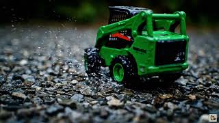 Yellow Mini Skid Steer: Epic Gravel Donut in 4K Slow Motion FPV!