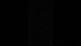 Capella Star twinkling red and green