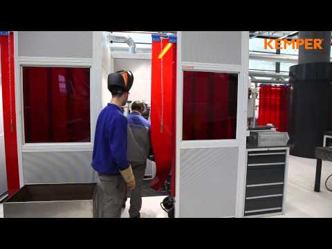 Centro de formación dentro de la empresa con cabinas de soldadura y sistemas de aspiración