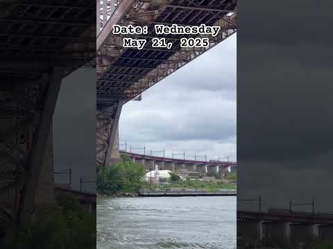 Amtrak Acela and Amtrak Northeast Regional Trains on the Hell Gate Bridge in Astoria, Queens