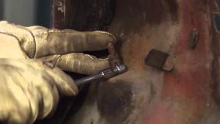 Removing the Emergency Brake Cable From a Car