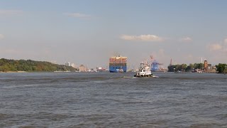 preview picture of video 'Hamburg, Germany: Finkenwerder, Elbe, Container Ship HYUNDAI HOPE, Pilot Boat - 4K Video Photo'