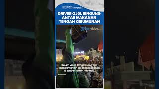 Driver Ojol Kebingungan Antar Pesanan Makanan di Tengah Lautan Manusia di Pergantian Tahun Baru