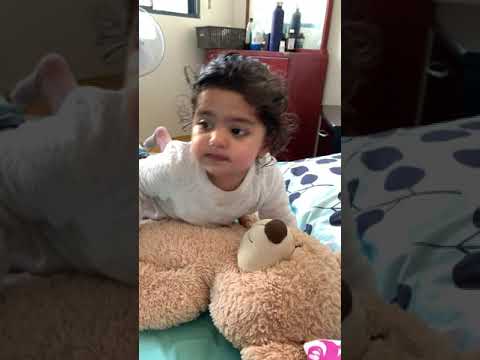 Dipisha playing with teddies