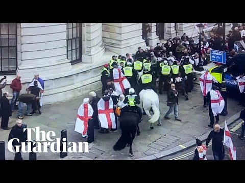 Police arrest several men as clashes break out at St George’s Day rally in London