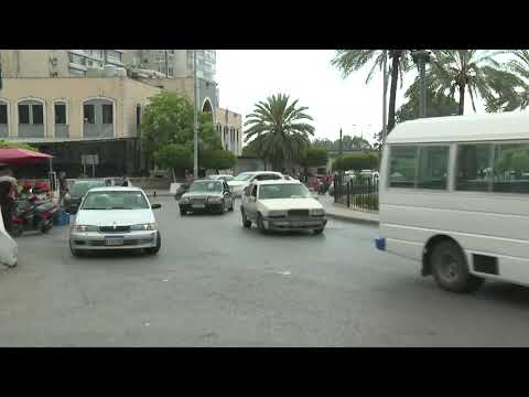 Ground shot of Beirut neighbourhood as residents evacuate