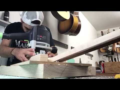 Lutherie mise à épaisseur d'une tête de guitare