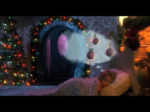 2000 theatrical trailer frame: Jim Carrey’s Grinch looming over Whoville