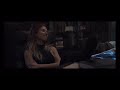 Female Avenger Relaxes Without Shoes On Movie Scene Black Socks