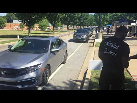 NFL running back Tavien Feaster greets fans in Spartanburg
