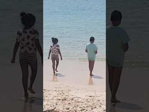 Aby Waru playing in the beach
