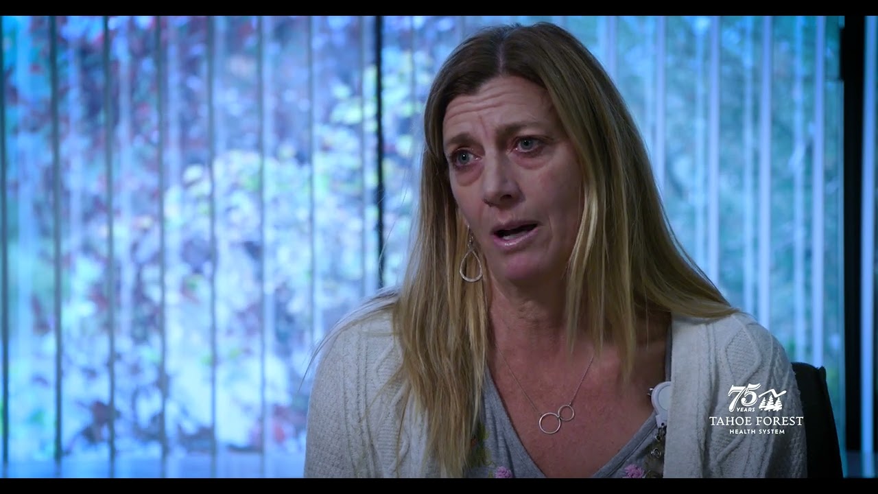 Wendy Buchanan, Director of Tahoe WoRx, sitting in front of a window