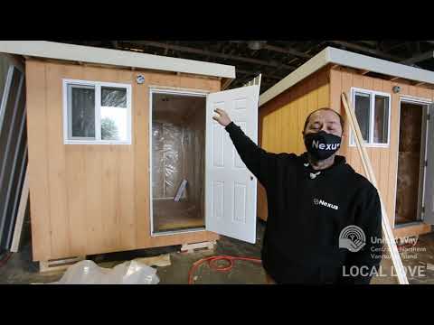 Builders work over the holidays to make cabin shelters for homeless
