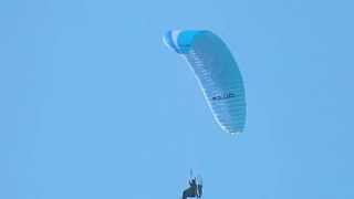 Motorised Paraglider over Rhyl Golf Club Denbighshire Wales UK