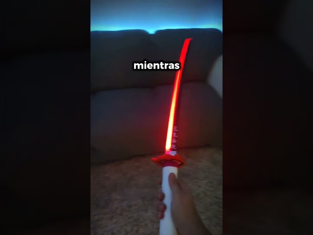 Vídeo relacionado con AMONT | Katana LED Decorativa Rengoku 105 cm | Réplica Japonesa en Bambú no Tiene Filo con Iluminación Roja y Dorada | Hoja de Fuego con Tsuba de Llama | Espada Ligera para Exhibición y Cosplay | EYM