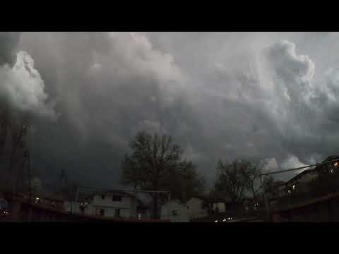 Severe storms opposite a colorful sunset