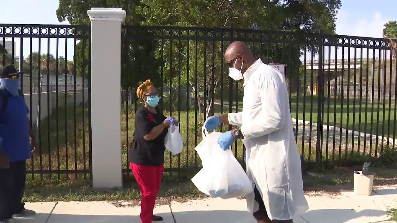 Dozens line up for food giveaway in Miami's Overtown neighborhood