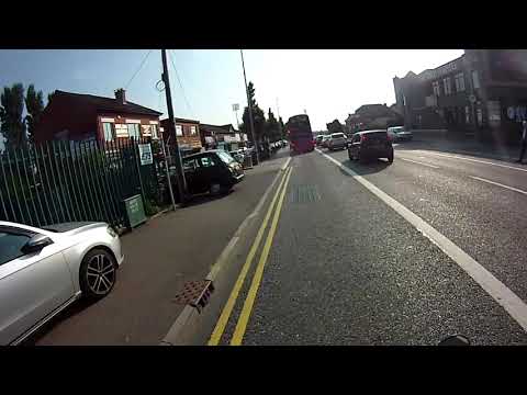 Young Passenger exiting car at an active bus lane.
