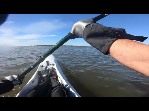 What is a pogie, and why do surfski paddlers need them?