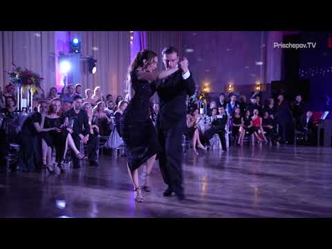  Sergey Kurkatov  and  Dana Zampieri  are  dancing  to  the  tango  "  Mentira  "  by  Alberto Moran  at  La Boca Tango Festival  in  2021
