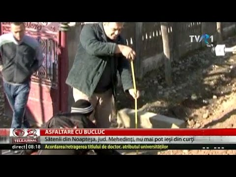 După asfaltarea drumului într-o comună din Mehedinţi, sătenii nu mai pot ieşi din curţi