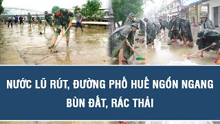 Nước lũ rút, đường phố Huế ngổn ngang bùn đất, rác thải