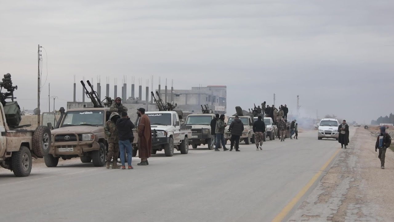 Video | Syrian military vehicles prepare to enter Kurdish-held town east of Aleppo | AFP