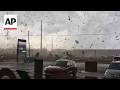 Debris Goes Flying As Suspected Tornado Strikes Michigan