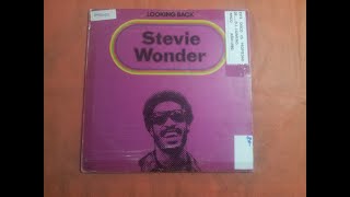 STEVIE WONDER.&#39;&#39;LOOKING BACK.&#39;&#39;.(SOMETHING OUT OF THE BLUE.)(12&#39;&#39; LP.)(1980.)