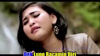 Download lagu [MUVIZA.COM] -iis erista lupo bacamin diri Minang VEVO.mp4 mp3