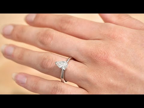 Silhouette: Pear Cut Diamond Solitaire Twist Ring | The Village Goldsmith