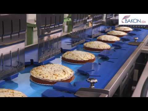 Inline ultrasonic cutting of round cake