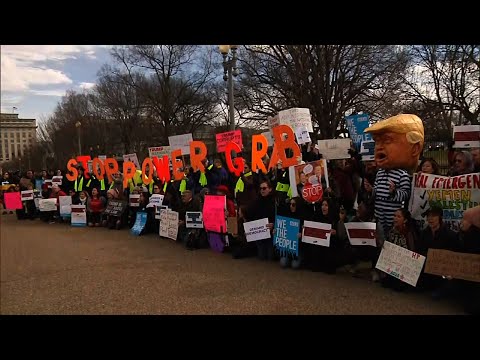 Critics of President Donald Trump's declaration of a national emergency along the U.S.-Mexico border protested outside the White House on Monday. (Feb. 18)