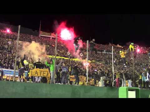 "La hinchada grita el tercer gol. Peñarol Campeón 2012-13" Barra: Barra Amsterdam &bull; Club: Peñarol